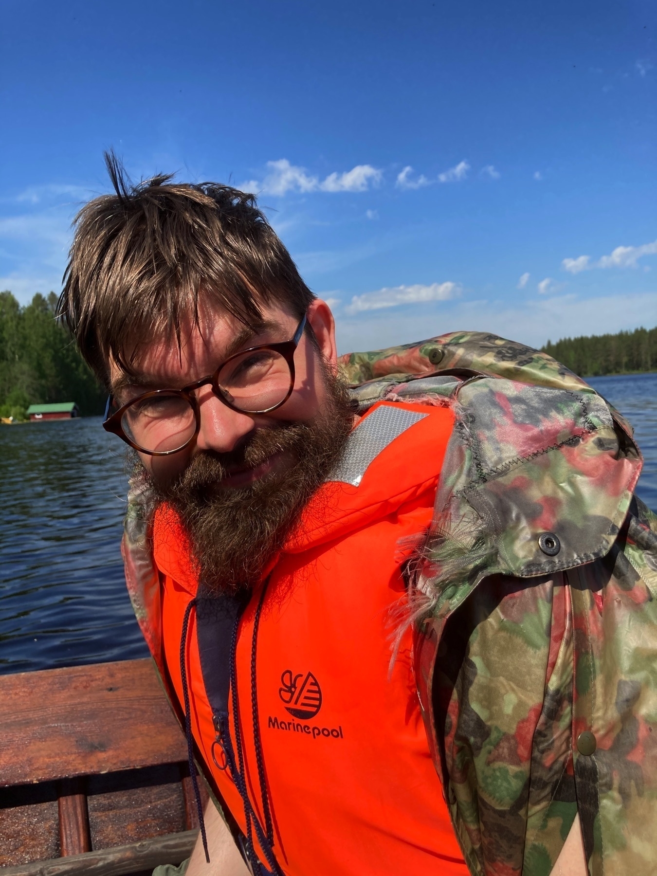 Just a slightly goofy picture of me sitting in a wooden boat, from a recent trip down the rapids around Ruuna in Eastern Finland.